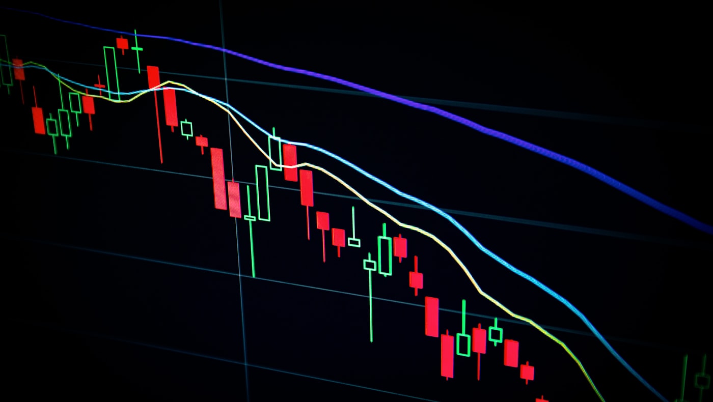 A red candlestick chart trending sharply downward